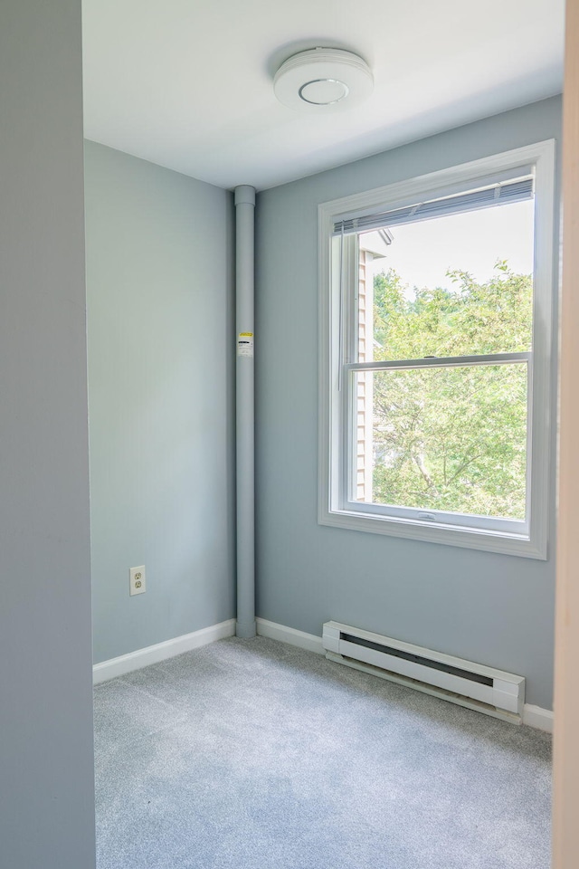 459 Allen Ave Unit 5, Portland, ME 04103 - carpeted empty room with baseboard heating and baseboards
