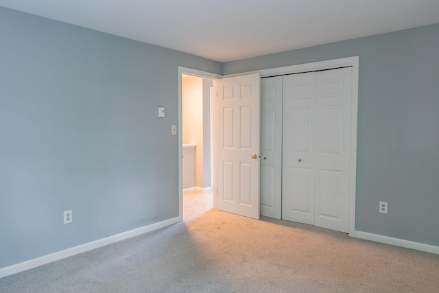 459 Allen Ave Unit 5, Portland, ME 04103 - unfurnished bedroom featuring carpet floors and a closet