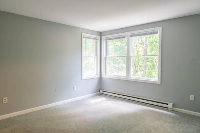 459 Allen Ave Unit 5, Portland, ME 04103 - carpeted empty room featuring baseboard heating and baseboards