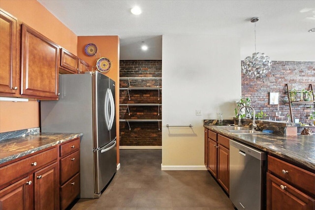 43 Lisbon St Unit 2B, Lewiston, ME 04240 - kitchen with appliances with stainless steel finishes, finished concrete flooring, pendant lighting, and brown cabinetry