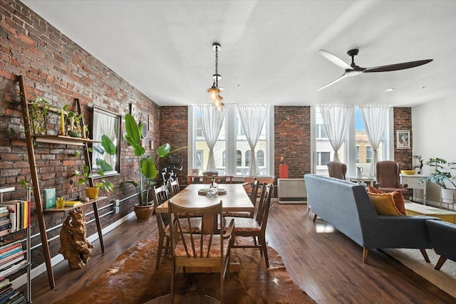 43 Lisbon St Unit 2B, Lewiston, ME 04240 - dining area featuring brick wall, plenty of natural light, wood finished floors, and a ceiling fan