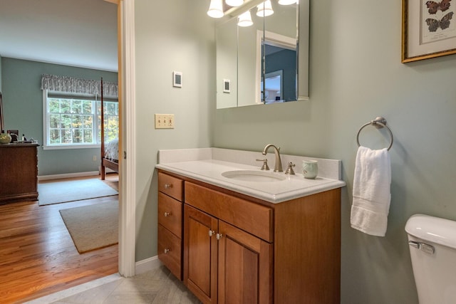 51 Tracy Cove Cir, Rome, ME 04963 - bathroom with vanity and wood finished floors