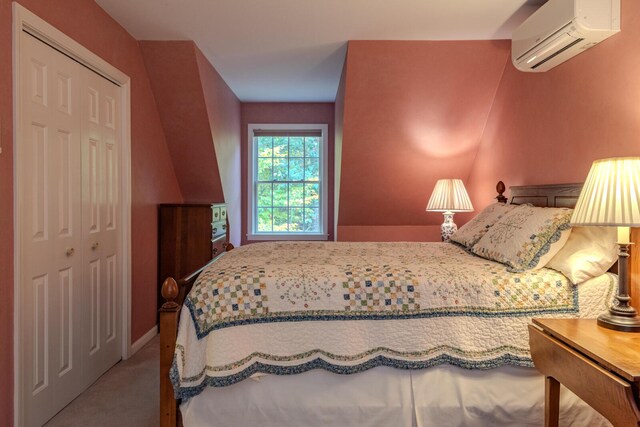 51 Tracy Cove Cir, Rome, ME 04963 - bedroom with a wall unit AC, carpet floors, and a closet