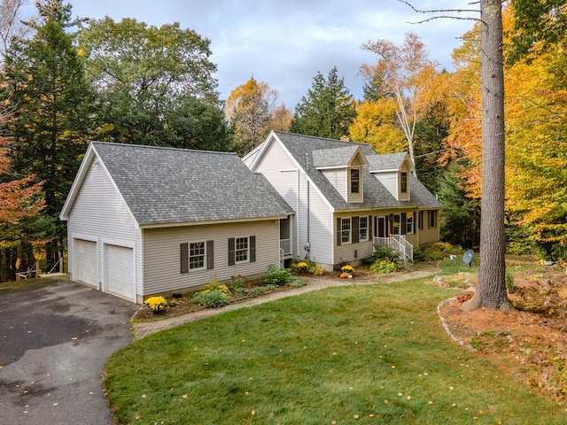 51 Tracy Cove Cir, Rome, ME 04963 - new england style home with a front yard, a shingled roof, driveway, a porch, and view of scattered trees