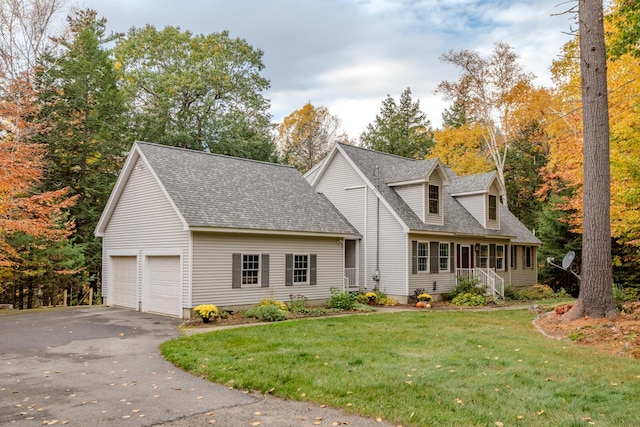 51 Tracy Cove Cir, Rome, ME 04963 - new england style home featuring roof with shingles, a front yard, and driveway