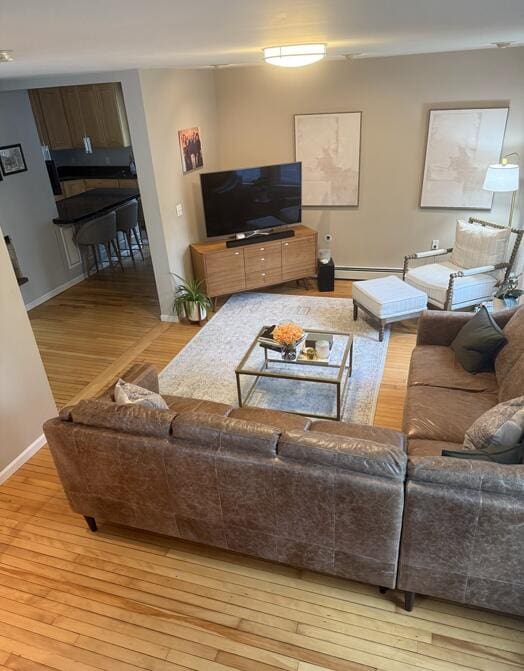 45 Tyler Ave, Bangor, ME 04401 - living area featuring wood-type flooring and baseboards