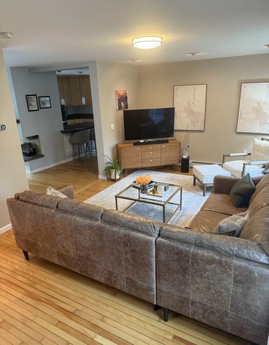 45 Tyler Ave, Bangor, ME 04401 - living area with wood finished floors and baseboards