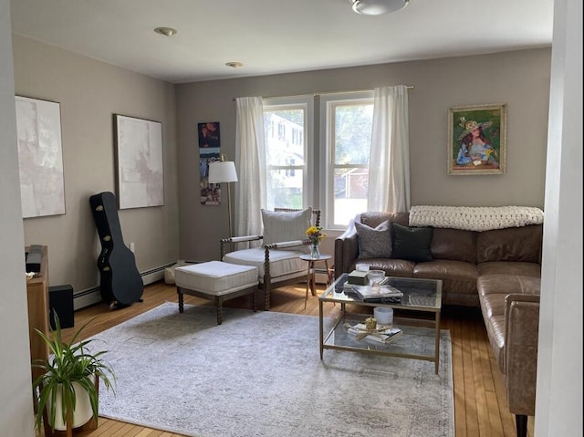 45 Tyler Ave, Bangor, ME 04401 - living room featuring wood finished floors and a baseboard heating unit