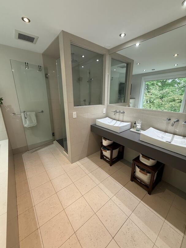 45 Tyler Ave, Bangor, ME 04401 - bathroom with tile patterned flooring, a shower stall, recessed lighting, and decorative backsplash