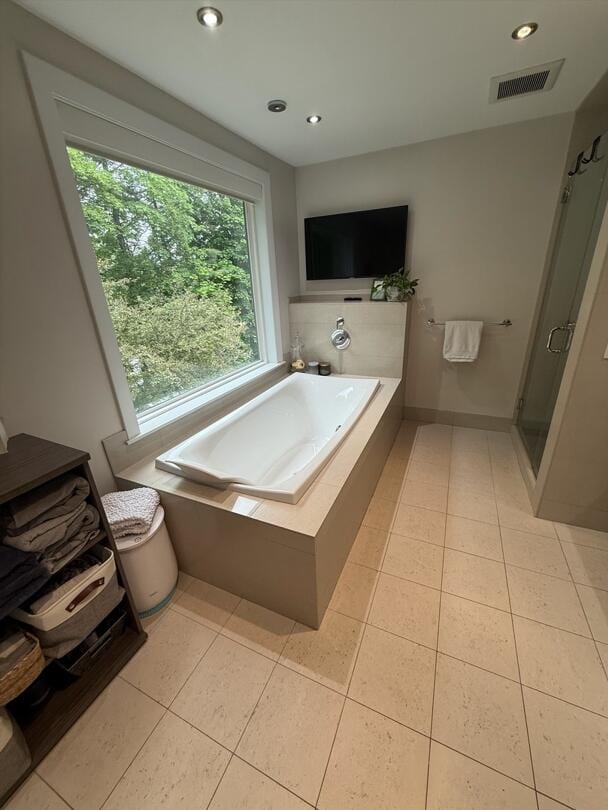 45 Tyler Ave, Bangor, ME 04401 - full bath with tile patterned floors, a bath, recessed lighting, and a shower stall