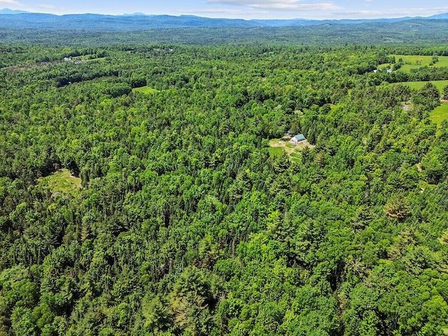 259 Drury Rd, Solon, ME 04979 - drone / aerial view of a heavily wooded area and mountains