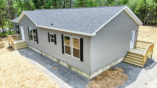 4 Willis Rd, Benton, ME 04901 - view of side of home with a shingled roof