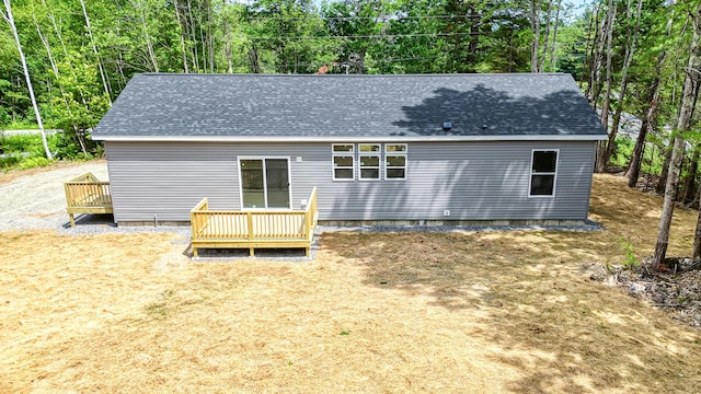 4 Willis Rd, Benton, ME 04901 - rear view of house featuring a wooden deck and a shingled roof