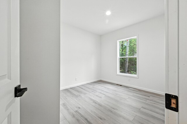 4 Willis Rd, Benton, ME 04901 - unfurnished room with light wood finished floors and recessed lighting