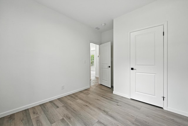 4 Willis Rd, Benton, ME 04901 - unfurnished bedroom featuring light wood-style flooring and baseboards
