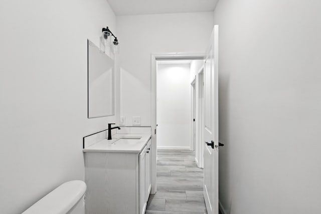 4 Willis Rd, Benton, ME 04901 - bathroom featuring vanity and wood finished floors
