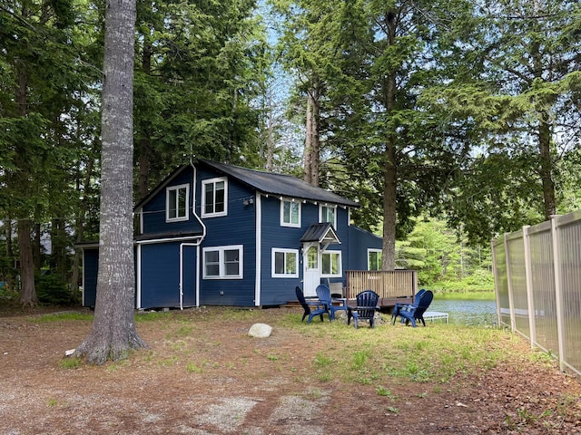 628 Springy Pond Rd, Otis, ME 04605 - rear view of house with view of scattered trees