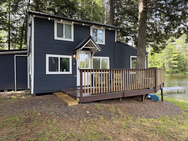 628 Springy Pond Rd, Otis, ME 04605 - rear view of property with a deck with water view