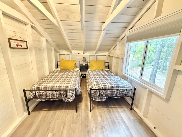 628 Springy Pond Rd, Otis, ME 04605 - bedroom with wood finished floors and wooden ceiling