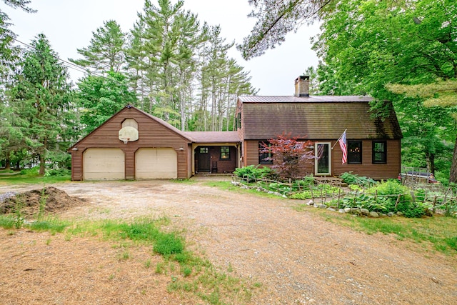 860 Gardiner Rd, Wiscasset, ME 04578 - dutch colonial with dirt driveway, a gambrel roof, an attached garage, a chimney, and roof with shingles
