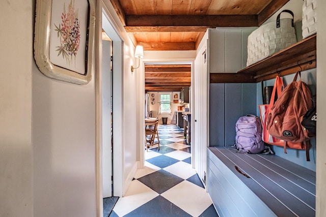 860 Gardiner Rd, Wiscasset, ME 04578 - hall with tile patterned floors and a wood ceiling with exposed beams