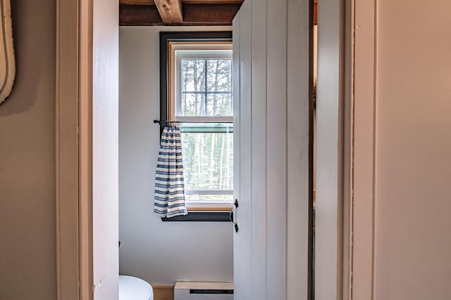 860 Gardiner Rd, Wiscasset, ME 04578 - bathroom with a baseboard heating unit, healthy amount of natural light, and beamed ceiling