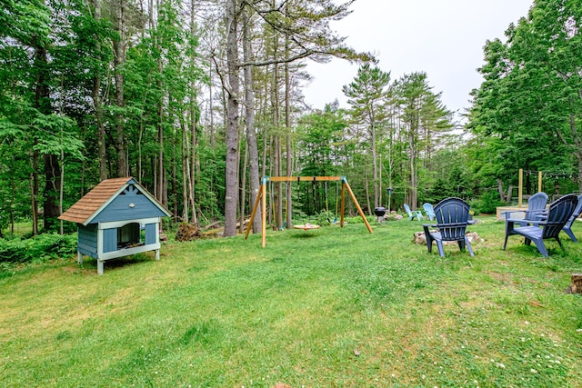 860 Gardiner Rd, Wiscasset, ME 04578 - view of grassy yard featuring a playground and an outbuilding