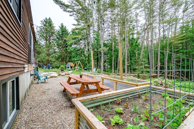 860 Gardiner Rd, Wiscasset, ME 04578 - view of yard featuring a garden and view of scattered trees