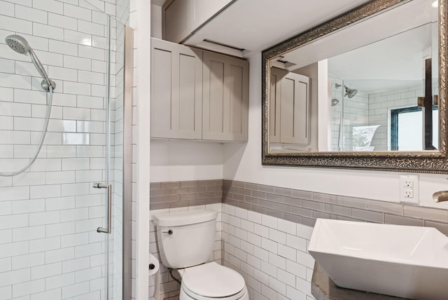 31 Knubble Rd, Georgetown, ME 04548 - bathroom with tile walls, a shower stall, and a wainscoted wall