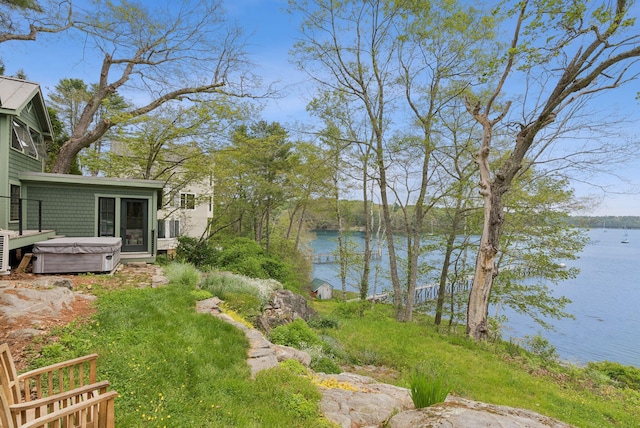 31 Knubble Rd, Georgetown, ME 04548 - view of yard with a hot tub and a water view