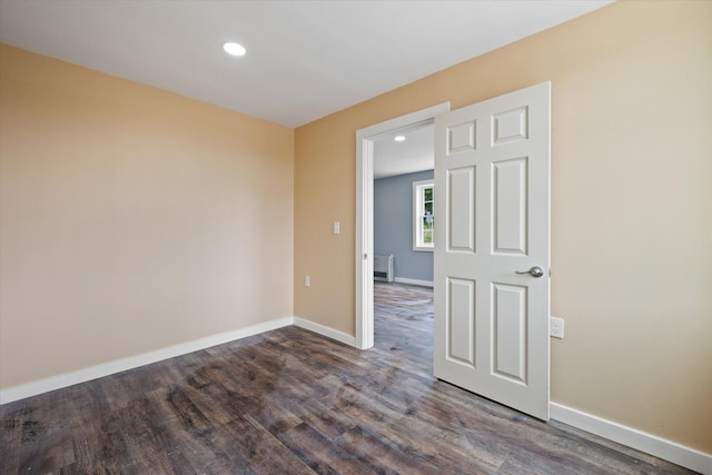 159 N St, Calais, ME 04619 - unfurnished room with recessed lighting and dark wood-style flooring