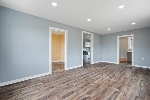 159 N St, Calais, ME 04619 - spare room with dark wood-style flooring and recessed lighting