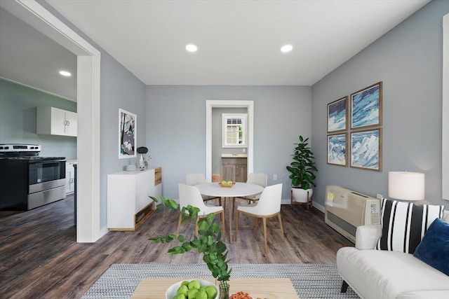 159 N St, Calais, ME 04619 - dining space with dark wood-style flooring, heating unit, and recessed lighting