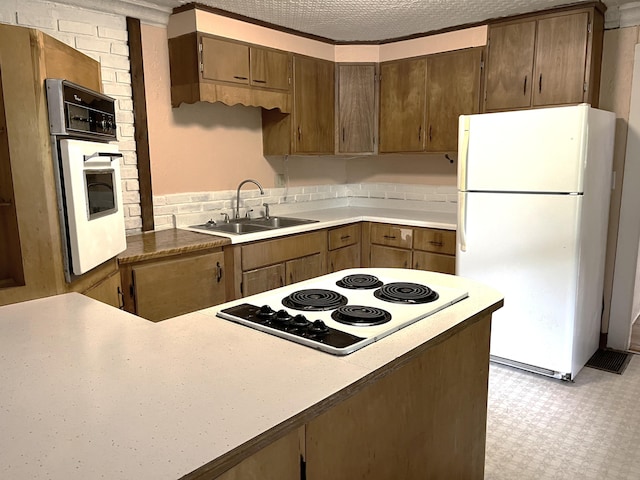 6 Autumn St, Lisbon, ME 04252 - kitchen featuring white appliances and light countertops
