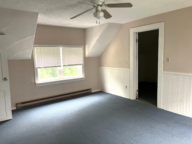 6 Autumn St, Lisbon, ME 04252 - bonus room with baseboard heating, carpet, a ceiling fan, a textured ceiling, and wainscoting