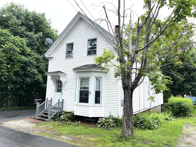6 Autumn St, Lisbon, ME 04252 - view of front of house with a chimney