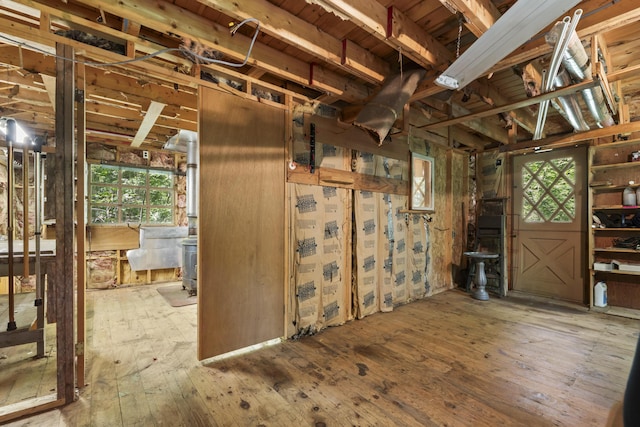 31 Convene Rd, Sebago, ME 04029 - below grade area with plenty of natural light and hardwood / wood-style flooring