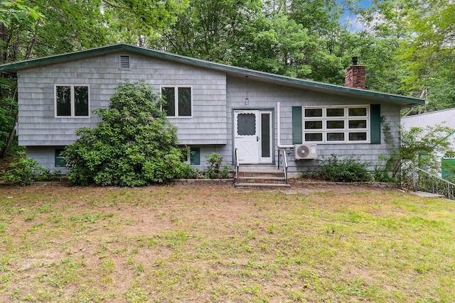106 Bowdoinham Rd, Sabattus, ME 04280 - tri-level home featuring a chimney and a front yard