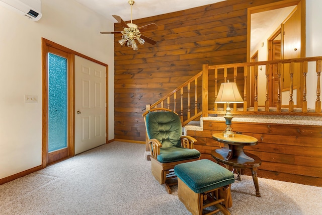 106 Bowdoinham Rd, Sabattus, ME 04280 - sitting room featuring carpet, ceiling fan, a wall unit AC, lofted ceiling, and wooden walls
