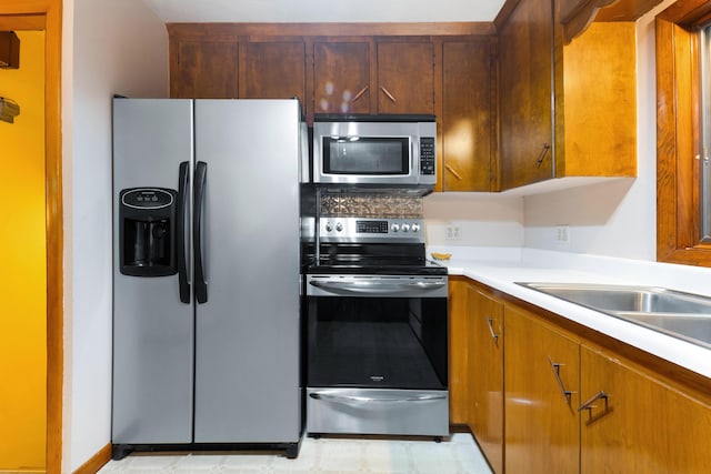 106 Bowdoinham Rd, Sabattus, ME 04280 - kitchen with stainless steel appliances and light countertops
