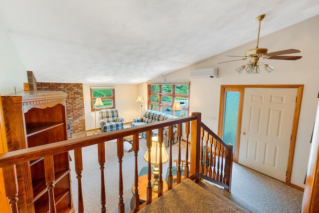 106 Bowdoinham Rd, Sabattus, ME 04280 - foyer featuring carpet flooring, ceiling fan, healthy amount of natural light, a wall unit AC, and vaulted ceiling