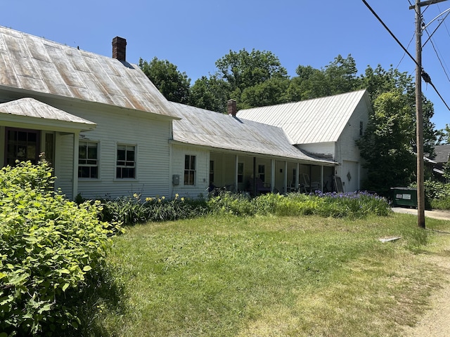 50 Church St, Weld, ME 04285 - back of house with a chimney and a metal roof