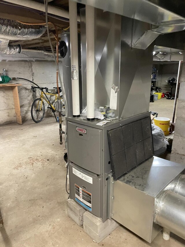 1165 Castine Rd, Penobscot, ME 04476 - utility room with heating unit