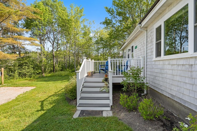 1165 Castine Rd, Penobscot, ME 04476 - view of green lawn featuring stairs and a deck