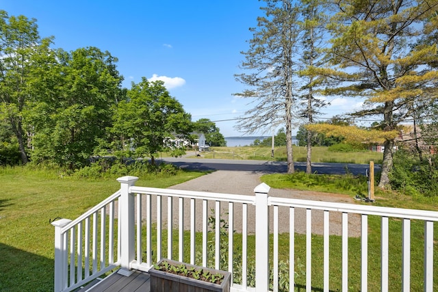 1165 Castine Rd, Penobscot, ME 04476 - wooden porch featuring a lawn