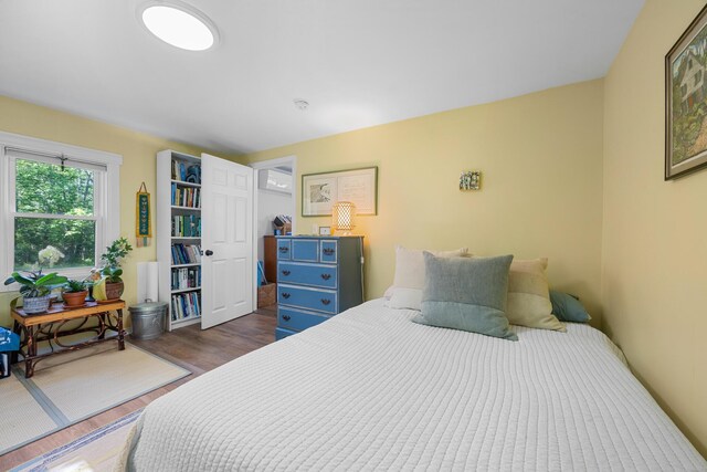 1165 Castine Rd, Penobscot, ME 04476 - bedroom featuring dark wood finished floors
