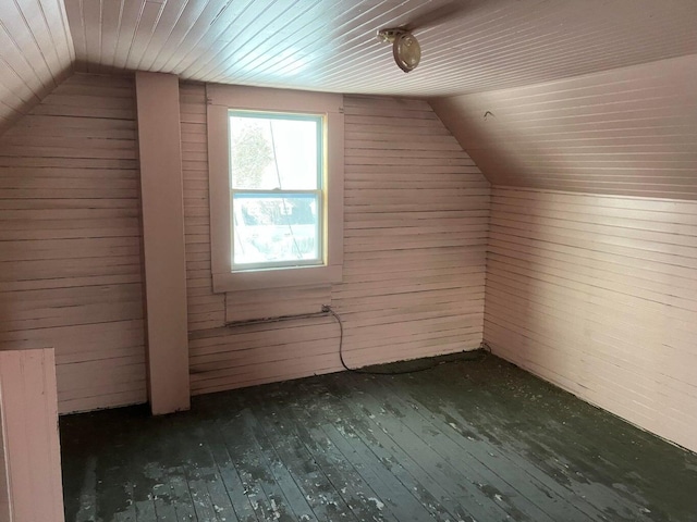 84 Pine St, Millinocket, ME 04462 - bonus room with dark wood-type flooring, vaulted ceiling, wood walls, and wooden ceiling