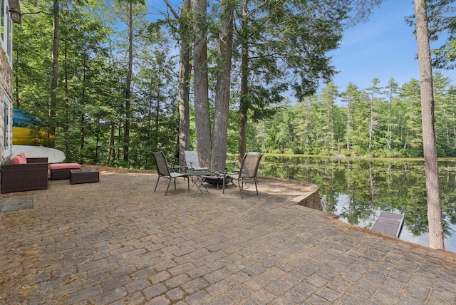 115 34th St, Acton, ME 04001 - view of patio with a water view and a fire pit
