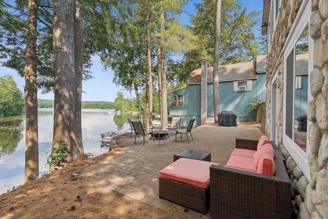115 34th St, Acton, ME 04001 - view of patio with a water view, an outdoor fire pit, and grilling area