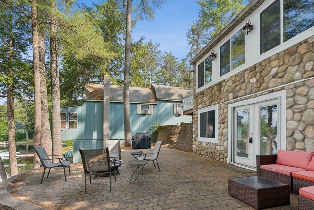 115 34th St, Acton, ME 04001 - view of patio featuring french doors, outdoor lounge area, and a grill